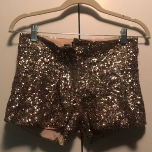 GOLD SEQUIN SHORTS BY BEBE